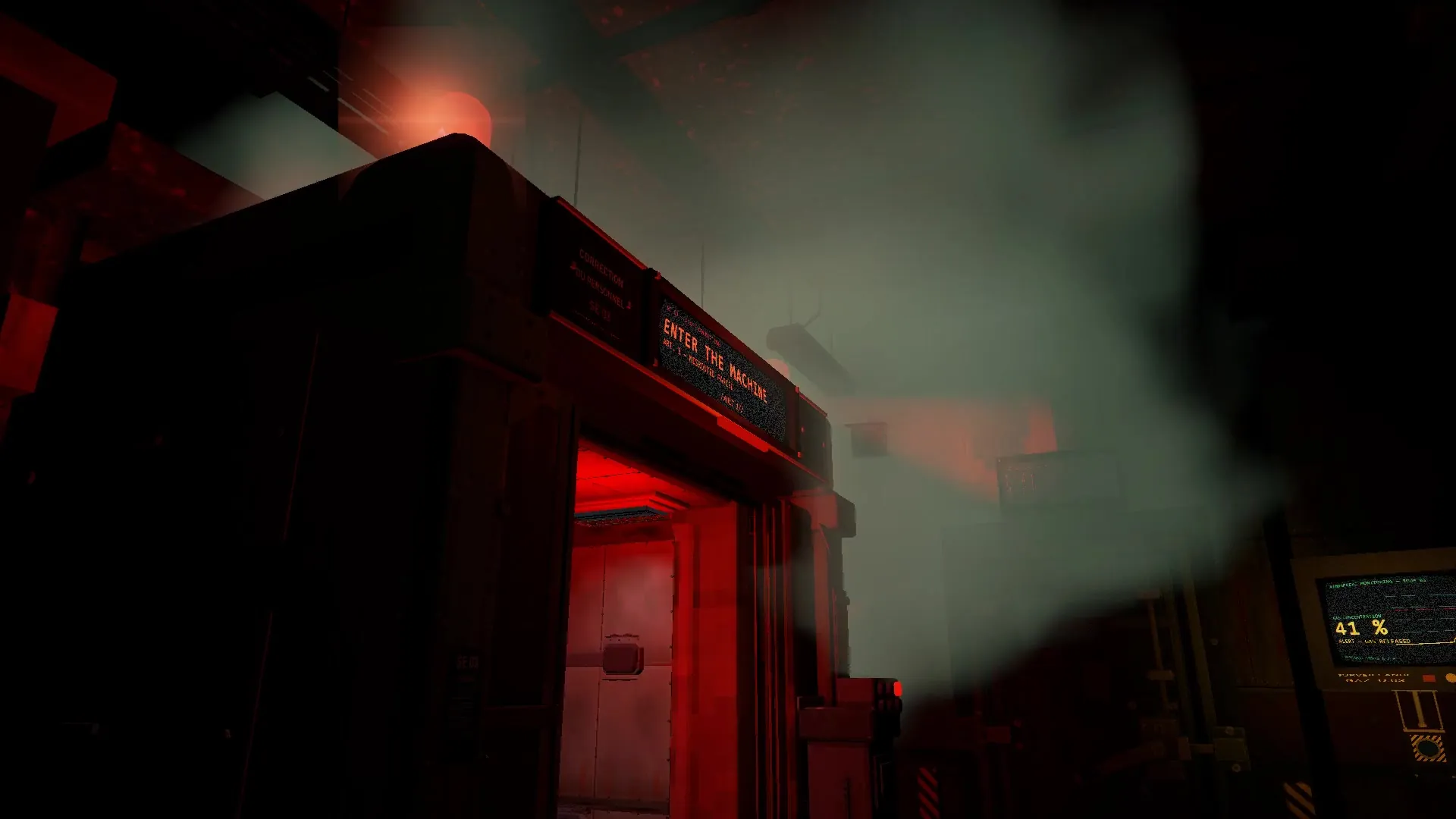 L’entrée éclairée de rouge d’une cabine, sous un écran « ENTER THE MACHINE », dans le gaz.